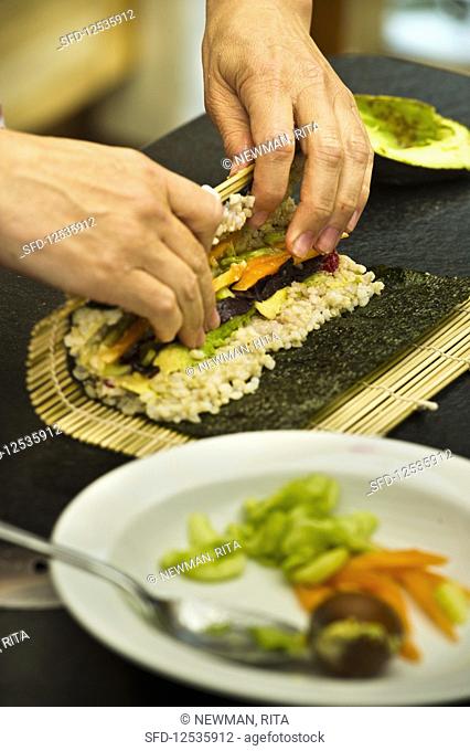 Vegan nori maki being made