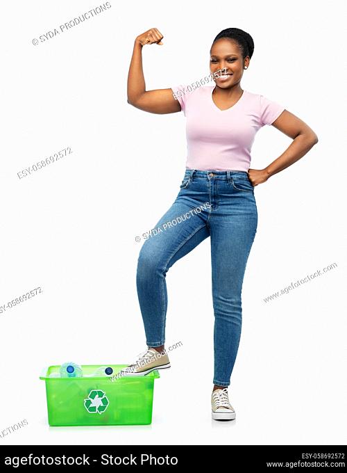 smiling young asian woman sorting plastic waste
