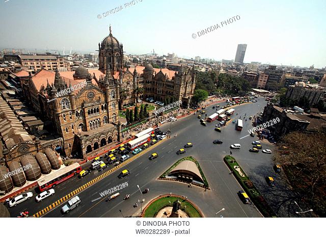 Traffic outside of Victoria Terminus VT now Chhatrapati Shivaji Terminus CST in Bombay Mumbai , Maharashtra , India UNESCO World Heritage