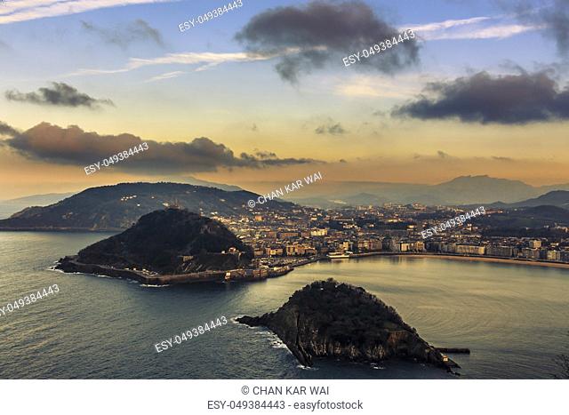 Aerial view of the resort town of San Sebastian in the mountainous Basque Country, Spain taken in the evening