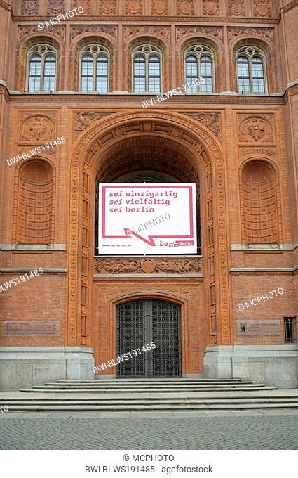 entrance of red town hall with writing: sei einzigartig, sei vielfaeltig, sei Berlin, Germany, Berlin