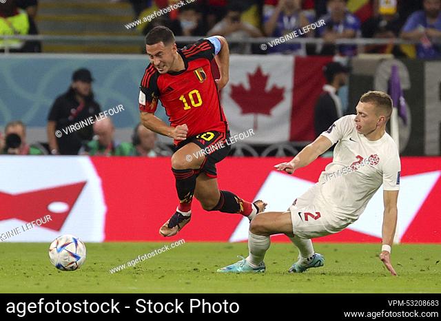 Belgium's Eden Hazard and Canadian Alistair Johnston pictured in action during a soccer game between Belgium's national team the Red Devils and Canada