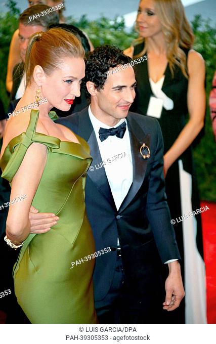 Actress Uma Thurman and designer Zac Posen arrive at the Costume Institute Gala for the ""Punk: Chaos to Couture"" exhibition at the Metropolitan Museum of Art...