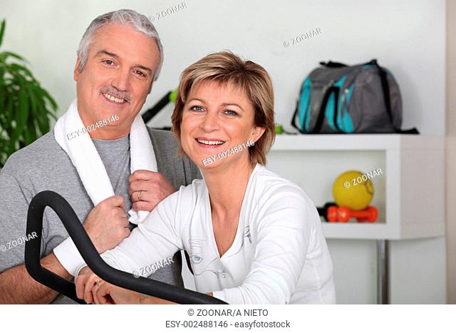 middle-aged couple going in for sport