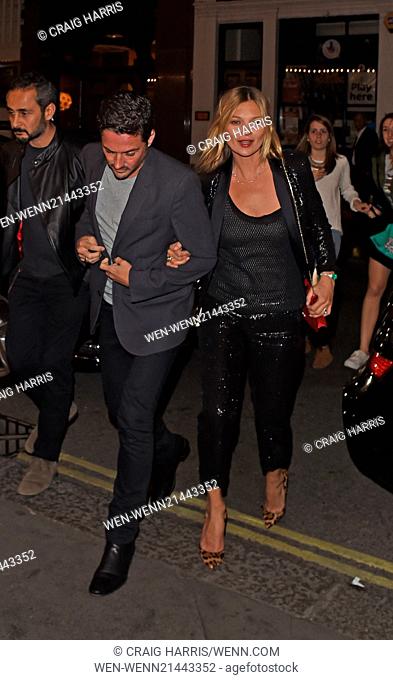 Kate Moss seen arriving arm in arm with david gardner as they arrived at J Sheekeys restaurant in London. Featuring: Kate Moss Where: London