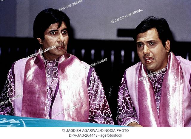 Amitabh Bachchan and Govinda sitting on chair, India, Asia