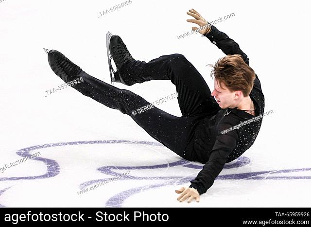 RUSSIA, CHELYABINSK - DECEMBER 21, 2023: Figure skater Alexei Yerokhov falls while performing his men's short programme during the 2024 Russian Figure Skating...