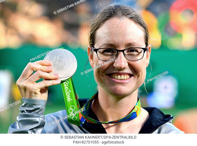 Silver medalist Lisa Unruh of Germany poses with her medal after the Women's Individual Gold Medal Match of the Archery events during the Rio 2016 Olympic Games...