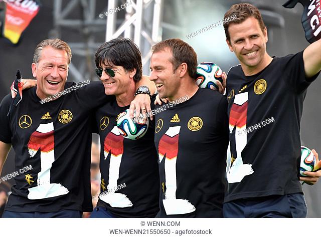 The Germany national football team celebrating their victory at Brandenburg Gate (Brandenburger Tor). 400, 000 fans gathered at the so called Fanmeile to greet...
