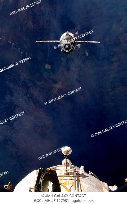 An unpiloted ISS Progress resupply vehicle approaches the International Space Station, carrying 1, 653 pounds of propellant, 110 pounds of oxygen