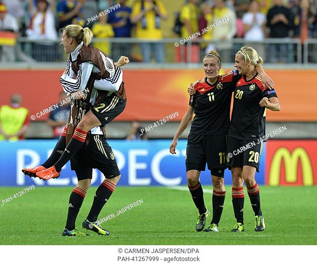 Luisa Wensing (L-R), Lena Lotzen, Anja Mittag and Lena Goeßling of Germany react after the UEFA Women's EURO 2013 semi-final soccer match between Germany and...