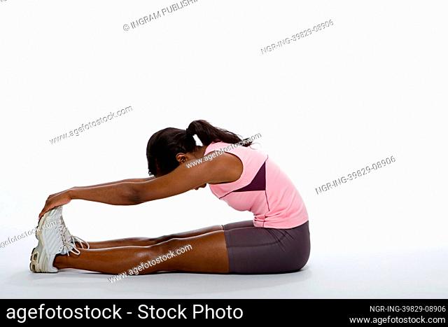 one woman stretching