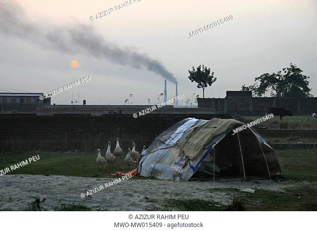 Smoke emitting from brickfields, at Aminbazar, outskirts of the capital city, Dhaka Bangladesh April 24, 2008