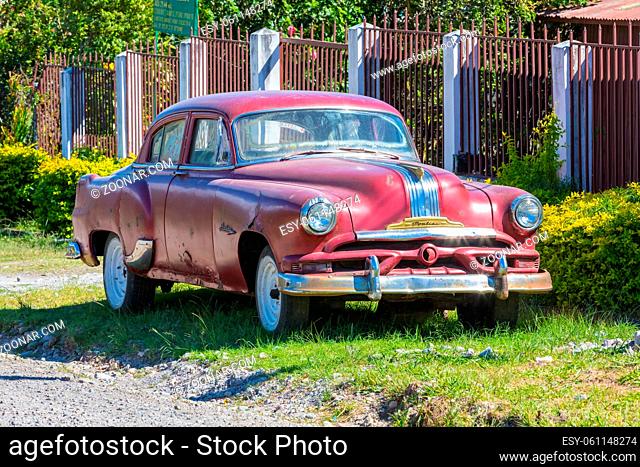 Boquete December 18 2018 in the high quarter of Boquete town is parked this old Pontiac car produced by General Motors. Pontiac is a name of a Native American...