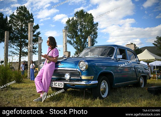 ARMENIA, STEPANAVAN - AUGUST 26, 2023: A Volga GAZ-21 car is on display at the Air Fest IV Stepanavan featuring planes, helicopters, skyballs, and paratrikes