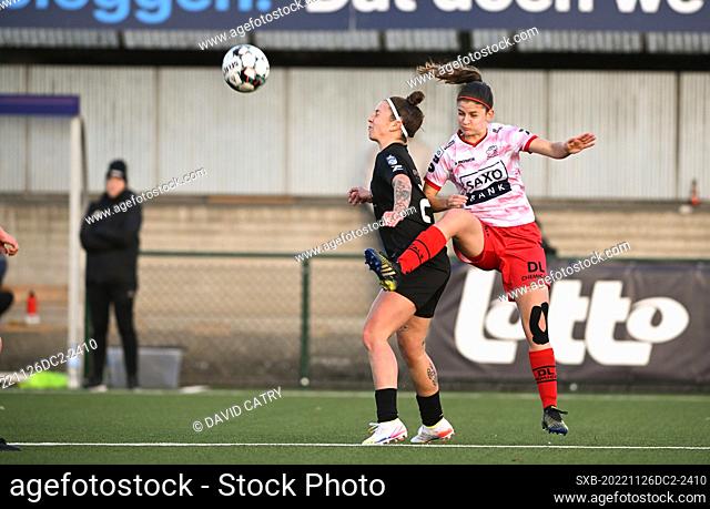 Celine Verdonck (27) of Woluwe pictured fighting for the ball with Amber De Priester (6) of Zulte-Waregem during a female soccer game between SV Zulte - Waregem...