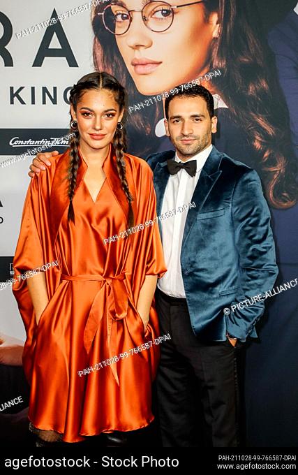 27 October 2021, Berlin: Nilam Farooq and Hassan Akkouch attend the premiere of the film ""Contra"" at the Zoo Palast cinema