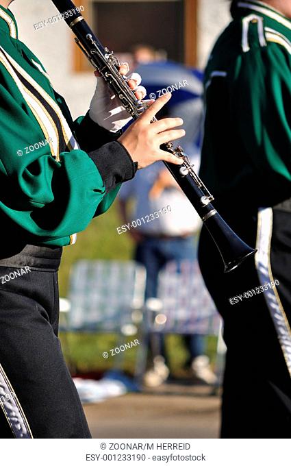 Marching Band Performer Playing Clarinet in Parade