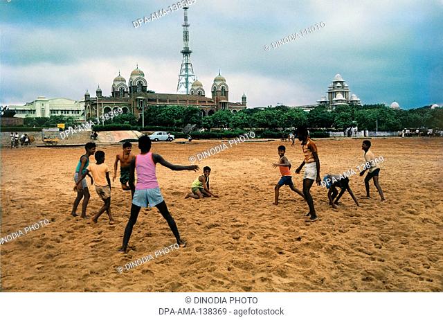 Children Playing at Marina beach ; Chennai ; Tamil Nadu ; India