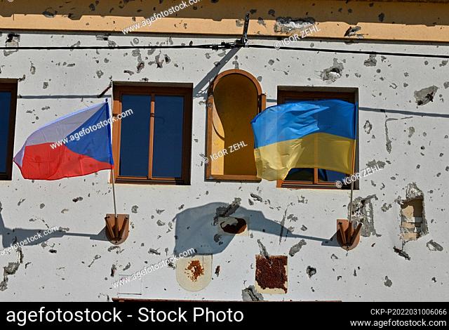 The Czech and Ukrainian flags on the tornado-damaged town hall building in Moravska Nova Ves in the Breclav District, Czech Republic, on March 10, 2022