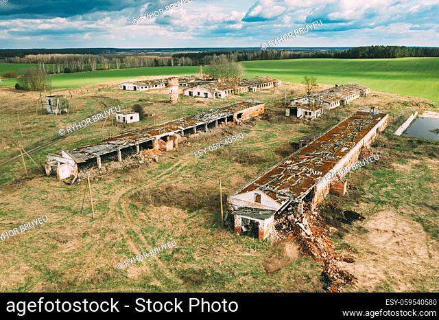 Belarus. Abandoned Barn, Shed, Cowsheds, Farm House In Chernobyl Resettlement Zone. Chornobyl Catastrophe Disasters. Dilapidated House In Belarusian Village