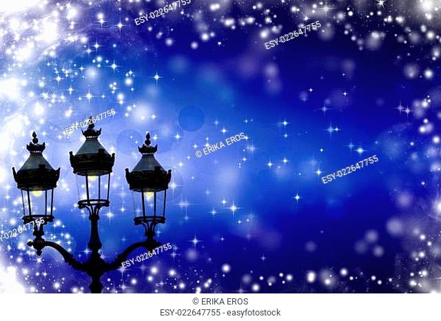 Christmas greeting card - white night with stars and street lamp