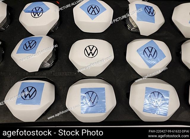 26 April 2022, Saxony, Zwickau: Airbags are located at Volkswagen's plant in Zwickau. In addition to VW vehicles, vehicles from the Group's Audi and Seat brands...
