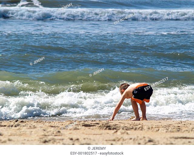 Boy Playing in the Sand