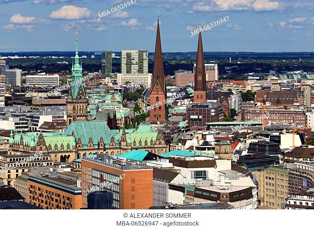 View from Michel on the city of Hamburg with the towers of the St. Peter's church, St. Jakobi church and city hall in the district Hamburg old town