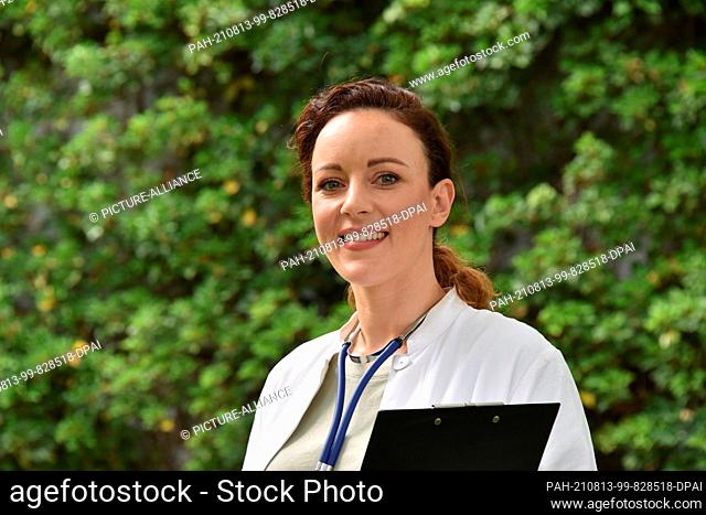 13 August 2021, North Rhine-Westphalia, Cologne: The actress and singer Jasmin Wagner (also known as Blümchen) poses in a doctor's coat