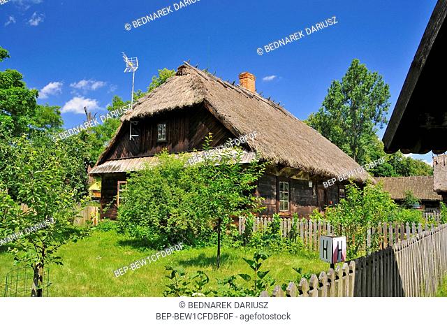 Museum of Agriculture in Ciechanowiec, Podlaskie voivodeship, Poland. Wooden cottages, garden, mill, church and other devices used to use by Pollish farmers