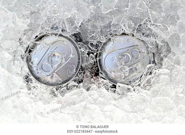 two drink can iced submerged in frost ice