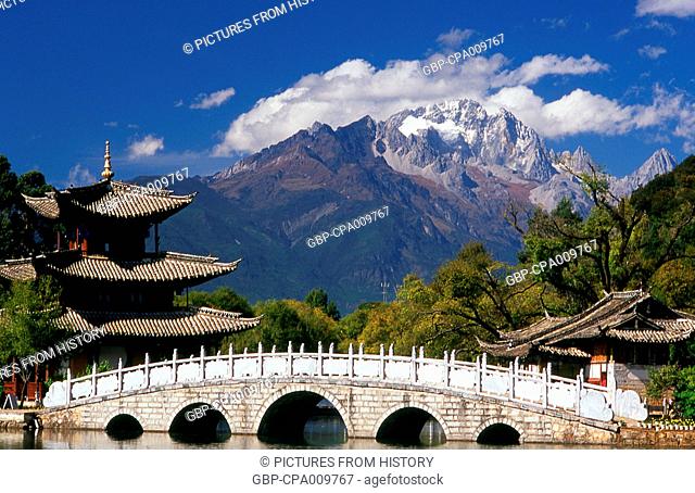 China: Jade Dragon Snow Mountain seen from Black Dragon Pool Park, Lijiang, Yunnan Province