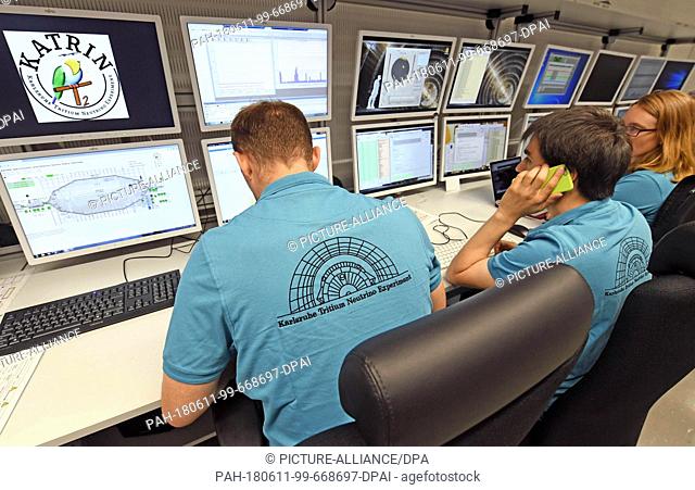 11 June 2018, Eggenstein-Leopoldshafen, Germany: Employees of the Karlsruhe Tritium Neutrino Experiment (KATRIN) at the Karlsruhe Institute for Technology (KIT)...
