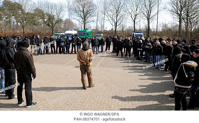 Around one hundred supporters of the party 'The Right' attend a rally and follow a speech by their chairman Christian Worch (C