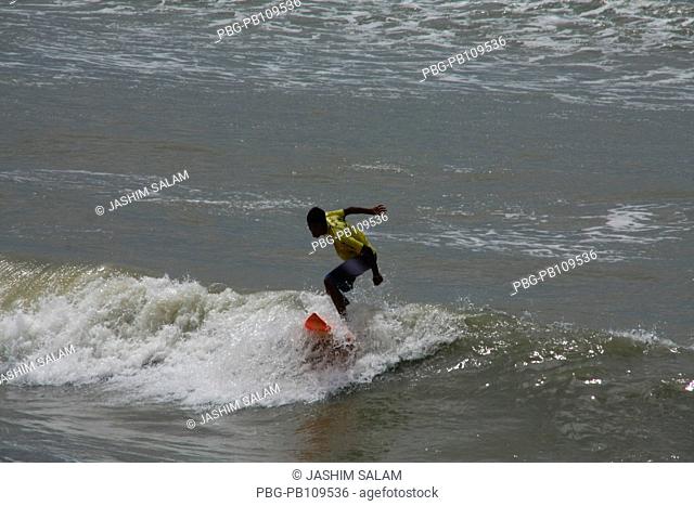 Surfing at the Bay of Bengal Surf the Nations organized 6th Surf Classic Tournament at Kolatoli Beach in CoxÆs Bazar More than 50 participants contested in...