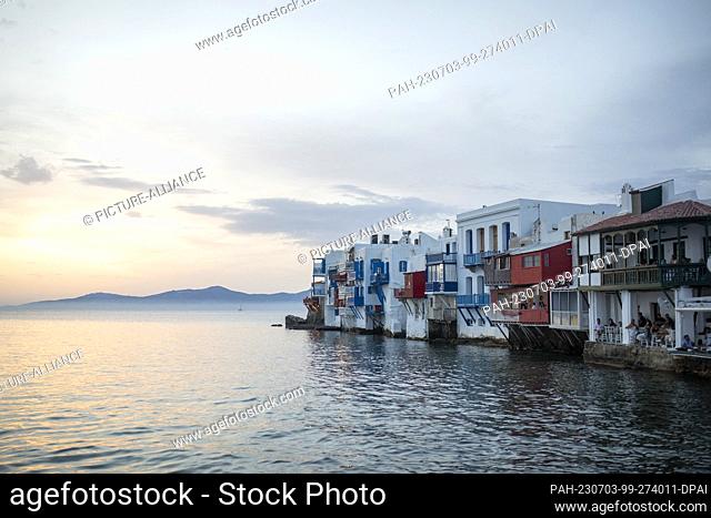 15 June 2023, Greece, Mykonos: Little Venice in Mykonos, one of the main attractions of the city on the island. Photo: Socrates Baltagiannis/dpa