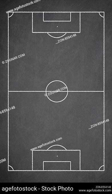 Soccer board drawn with white chalk on a blackboard