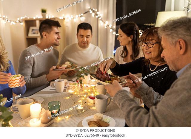 happy family having tea party at home
