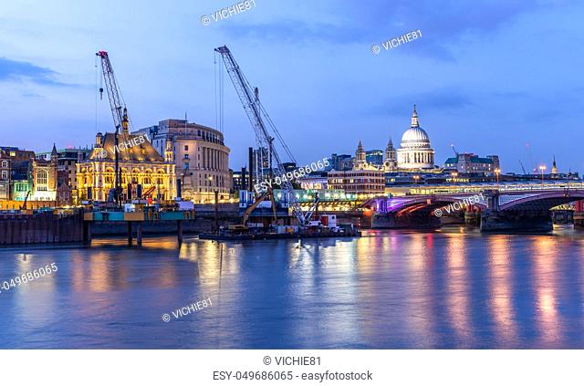 Panoramic of St paul cathedral with river thames sunset twilight in London UK