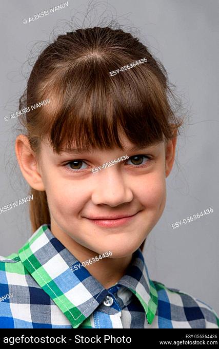 Portrait of a cute ten year old girl, European appearance, close-up
