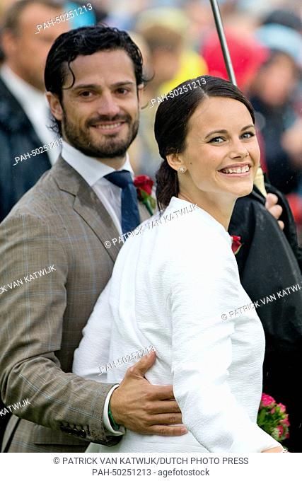 Prince Carl Philip of Sweden and his wife to be Sofia Hellqvist pose for photographs during the celebrations of Crown Princess' 37th birthday in Borgholm
