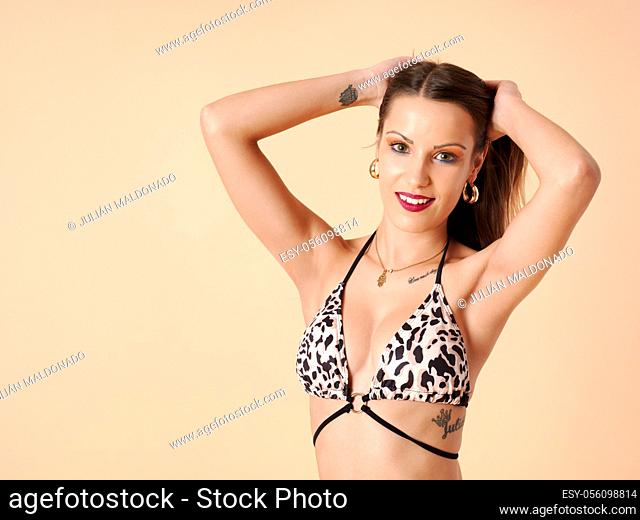 Beautiful Young Woman with Bikini or Swimwear Fashion and Sexy Posture