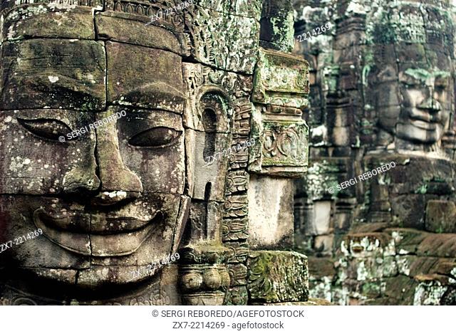 The faces of the Bayon temple. Angkor Thom. Angkor Thom was built as a square, the sides of which run exactly north to south and east to west