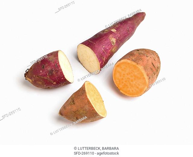 Two different sweet potatoes, cut in half