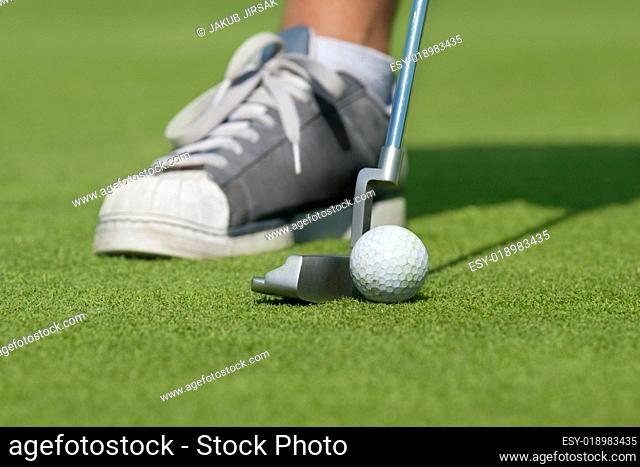 Golfer with driving-putter