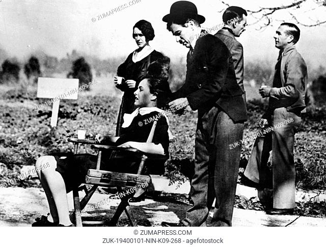 Jan. 1, 1940 - Los Angeles, CA, U.S. - CHARLIE CHAPLIN and PAULETTE GODDARD on a movie set, preparing for the shooting. An Oscar-nominated American film and...