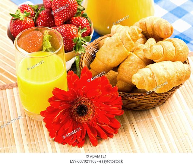 early breakfast, juice, croissants and Berries, still life