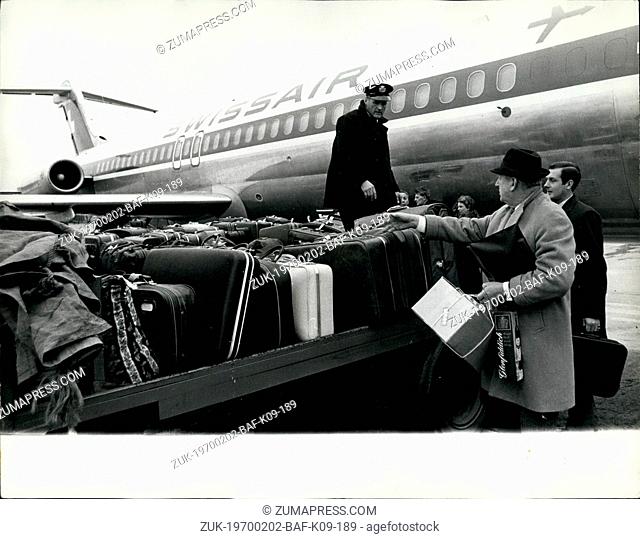 Feb. 02, 1970 - AIRLINER PRECAUTIONS: A passenger identifying his luggage before boarding a Zurich-bound airliner at Heathrow Airport yesterday