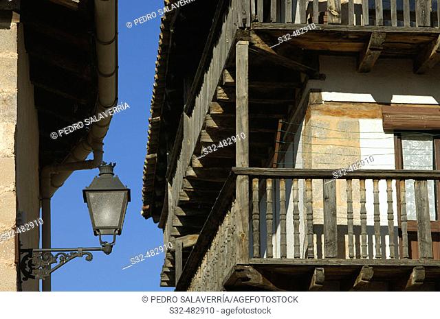 Lamp and balconies. Peñarroya de Tastavins. Teruel province. Aragon. Spain